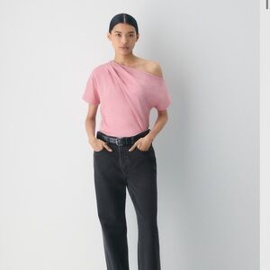 Aritzia Babaton 
INTERLOCK COTTON SCRIPT TOP Soft Pink One-Shoulder Blouse